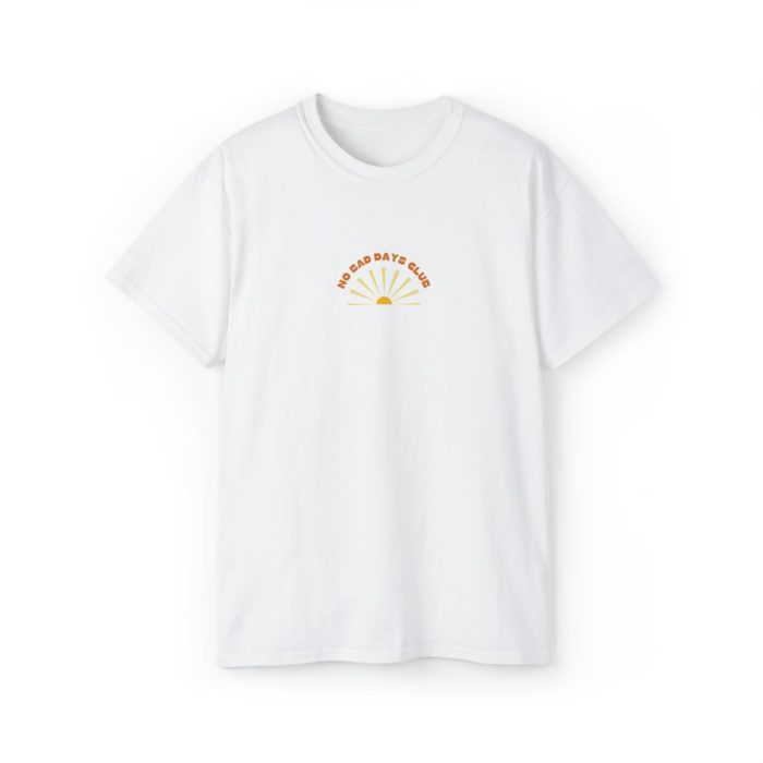White T-shirt featuring 'No Bad Days Club' logo above a vibrant beach scene with palm trees and waves, displayed on a plain background.