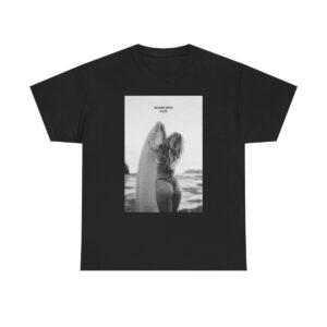 Black T-shirt featuring 'No Bad Days Club' logo, with a vibrant graphic of a beach scene including surfboards, the sea, and a bright sun, displayed on a plain background.